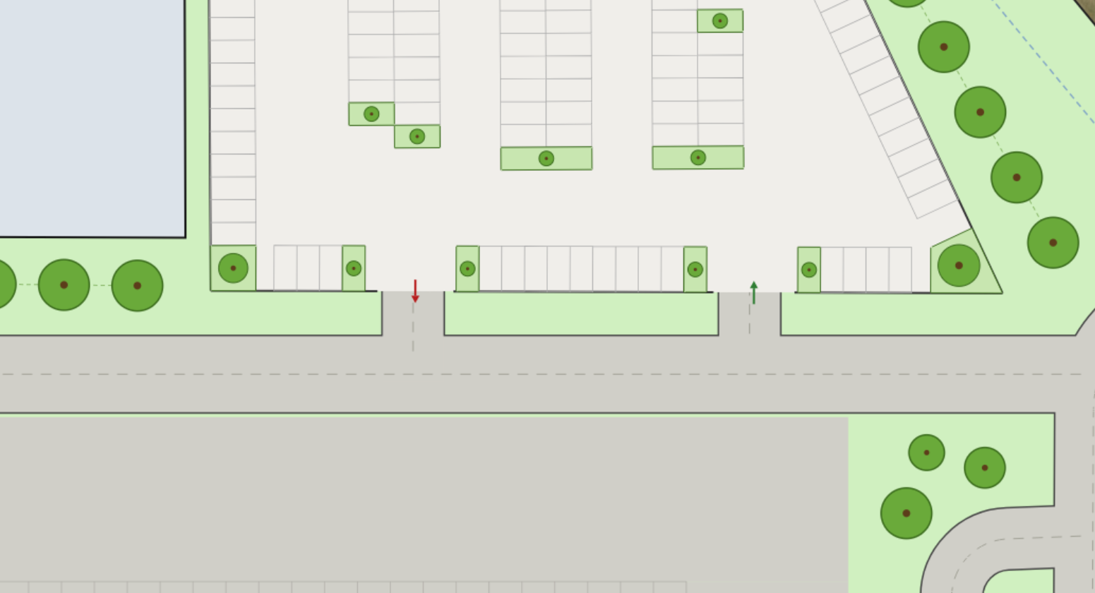 Close-up of parking lot access points showing in and out driveway arrows connecting to the street